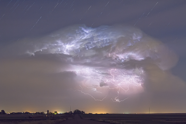 Cumulo nimbus Lightning Storm and Star Trails Above Print