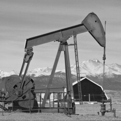 Oil Well Pumpjack Red Barn and Longs Peak BW