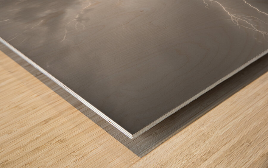 Black and White Lightning Thunderstorm with Color Light Trail Wood print